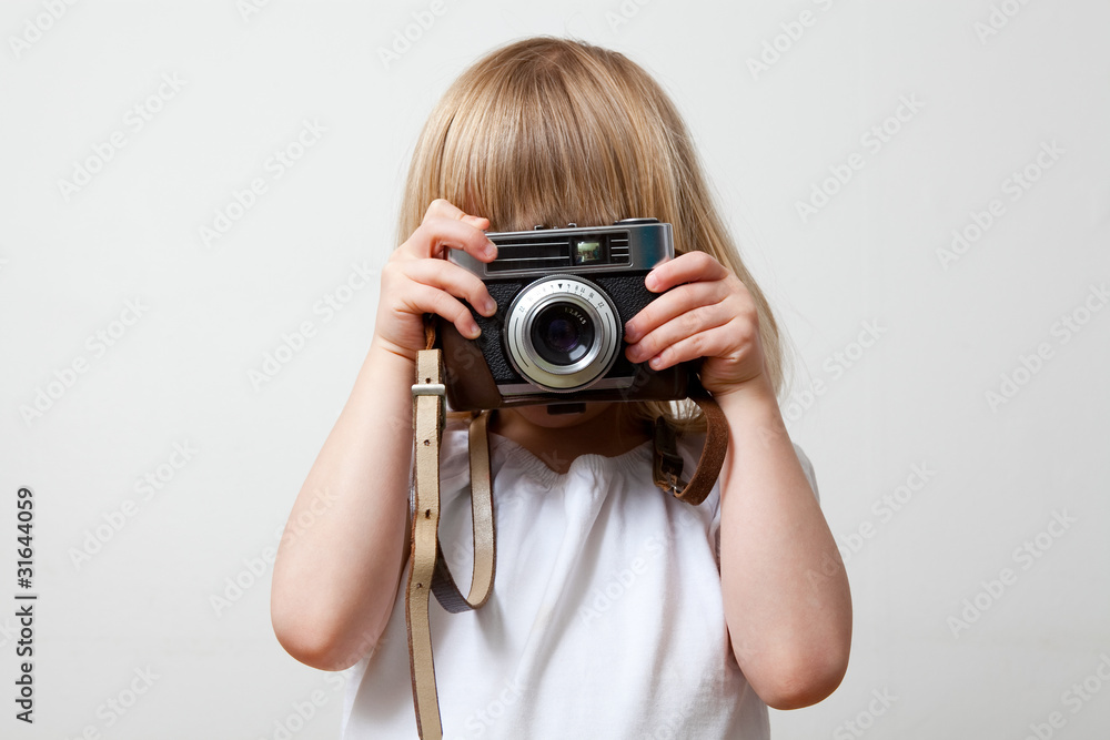 Little girl with camera Little girl with camera