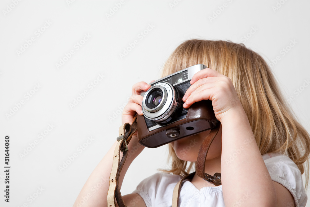Little girl with camera Little girl with camera