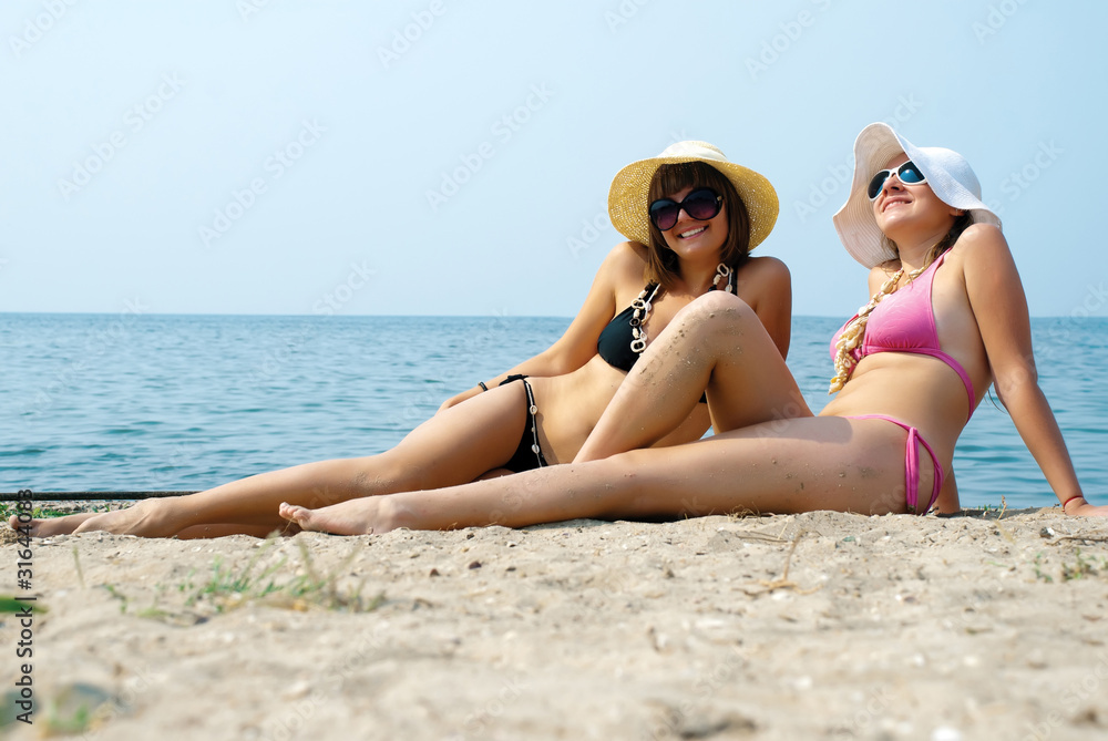 Happy girls on the beach