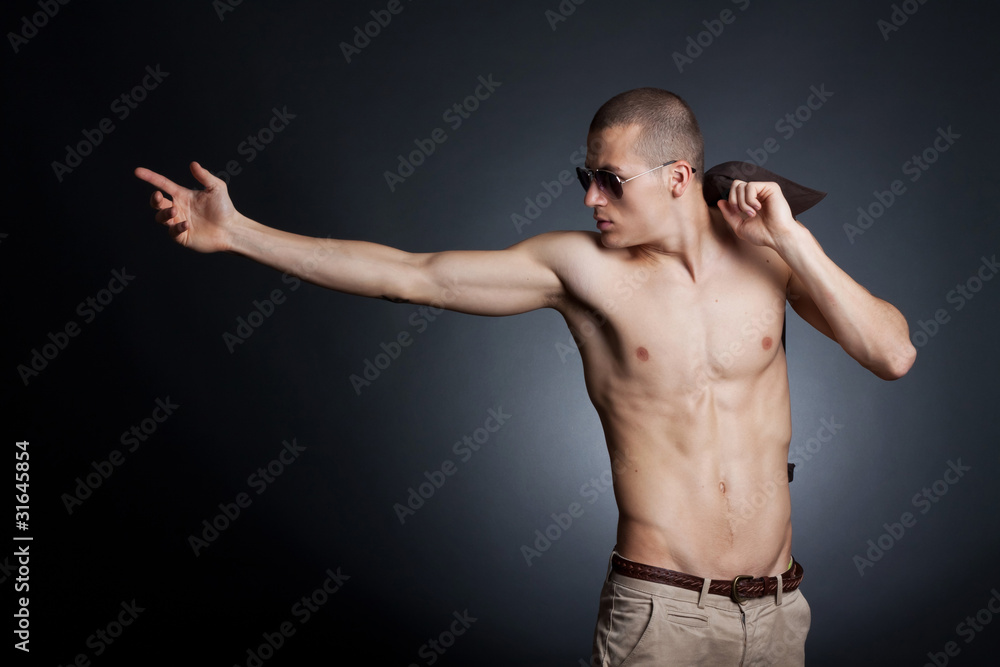 shirtless young male with sunglasses shirtless young male with sunglasses