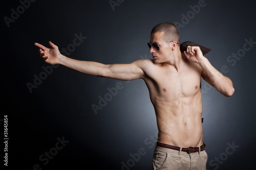 shirtless young male with sunglasses