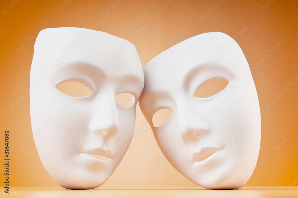 Theatre concept with masks against background Theatre concept with masks against background