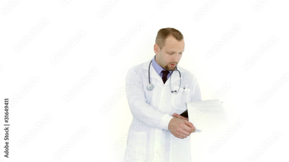 Male doctor checking clipboard, isolated on white Male doctor checking clipboard, isolated on white