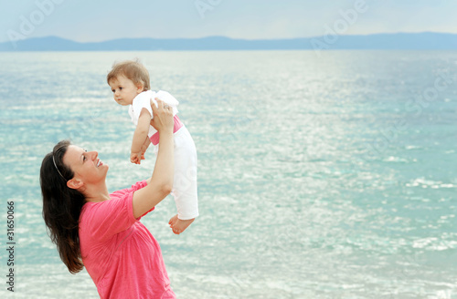 Mother with her baby at beach
