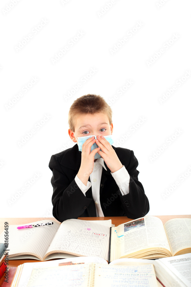 schoolboy in flu mask isolated on the white