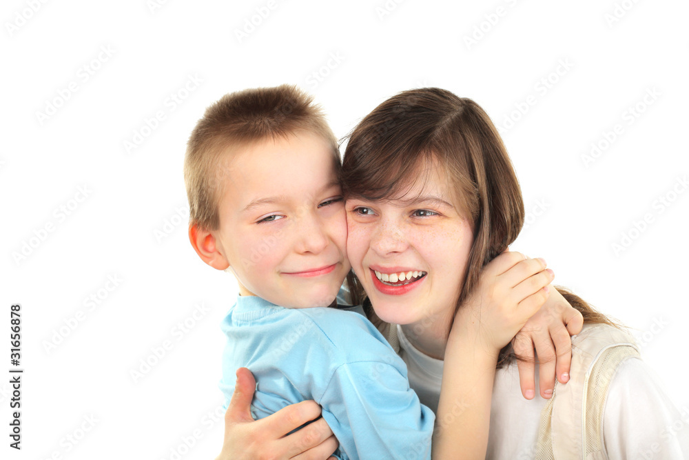 happy brother and sister laughing isolated on the white happy brother and sister laughing isolated on the white