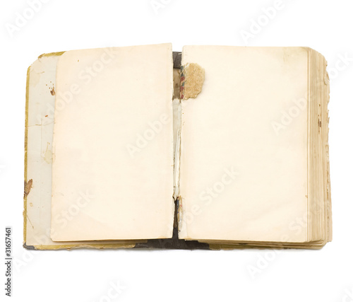 The ancient book isolated on white