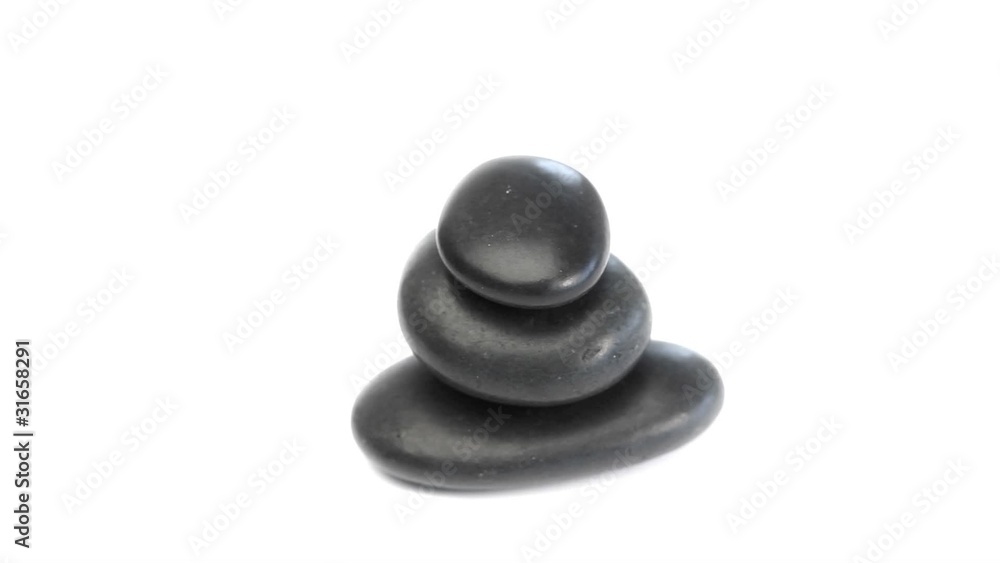 Black pebbles turning on themselves Black pebbles turning on themselves