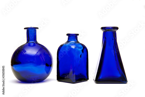 Obraz w ramie three blue bottles