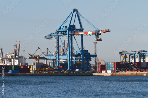 port with cranes and containers in Genoa, Italy