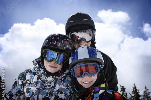 mother with two boys skiing © Rainer
