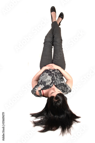 Girl lying on back.