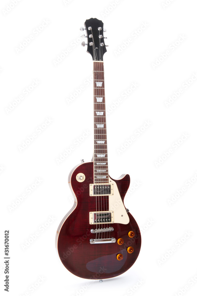 Naklejka premium Musical guitar isolated on the white background