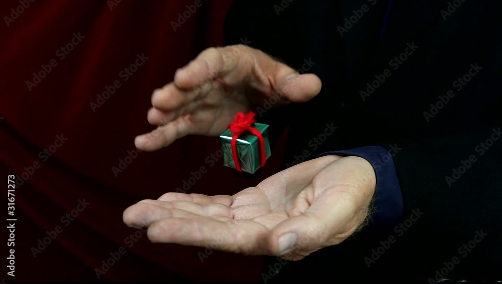 Magician Levitates a Gift. Magician Levitates a Gift.