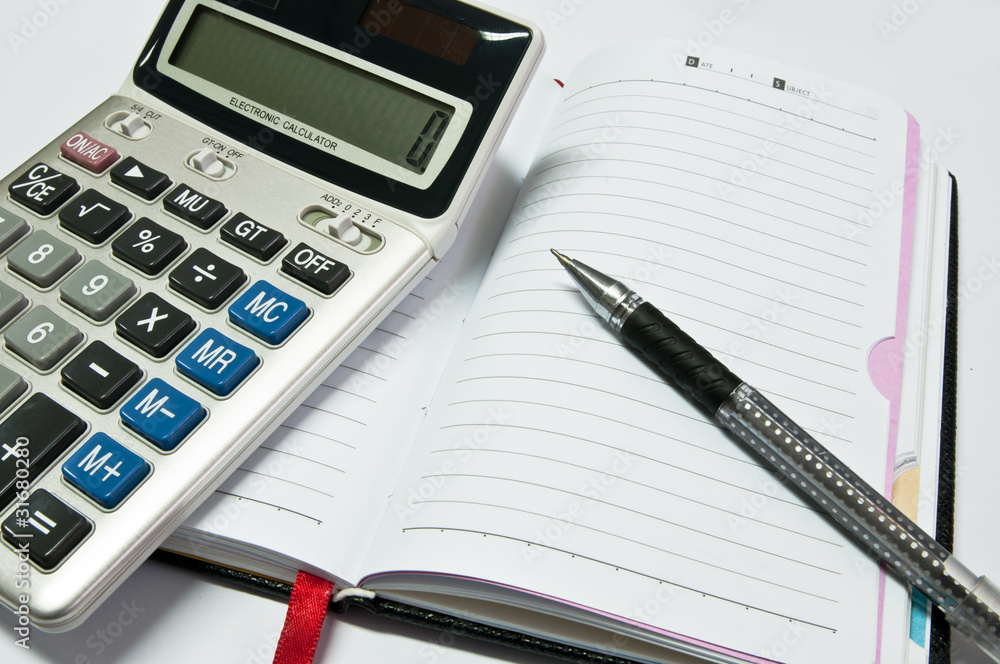 the electronic calculator, notebook, pen the electronic calculator, notebook, pen