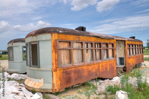 An Orange Rusty Old Abandoned Railway Car