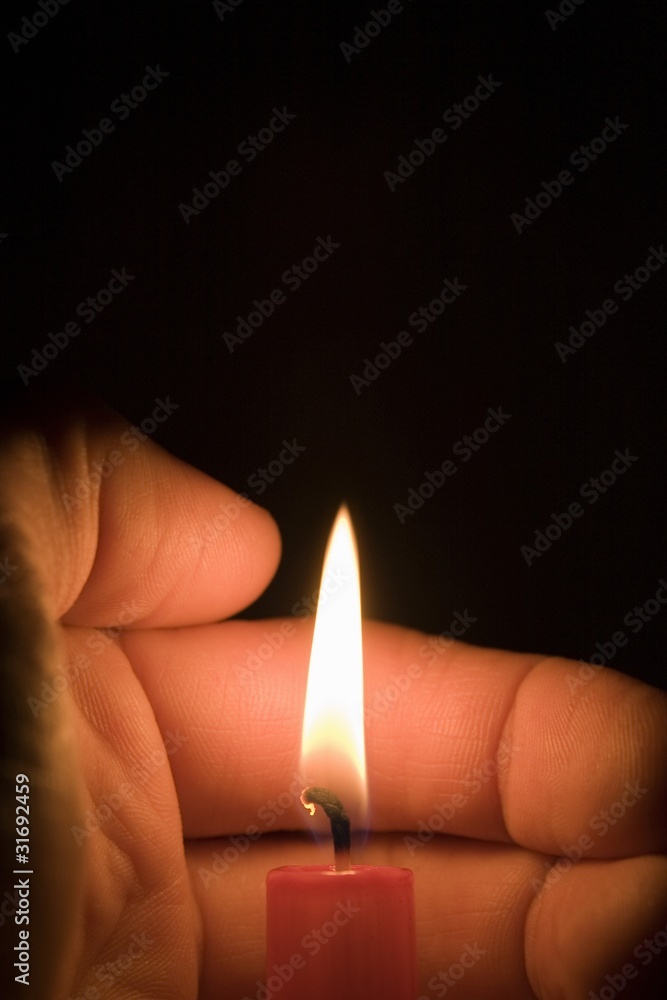 © Vibe Images - Hand And Candle