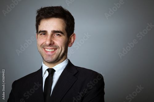 Close-up portrait of a handsome young business man