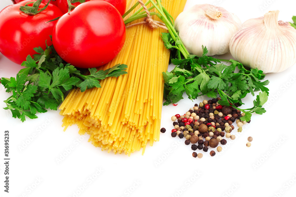 Pasta spaghetti with tomatoes, olive oil and basil on a white ba Pasta spaghetti with tomatoes, olive oil and basil on a white ba