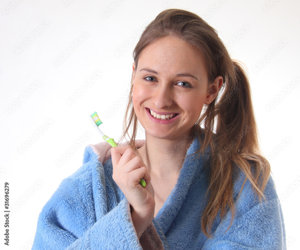 Красивая молодая девушка с зубной щеткой на белом фоне Stock Photo | Adobe  Stock