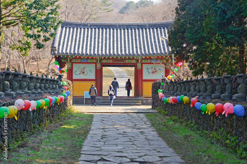 Entering alley and gate of Gwaneumsa buddhist Temple at Jeju Isl photo