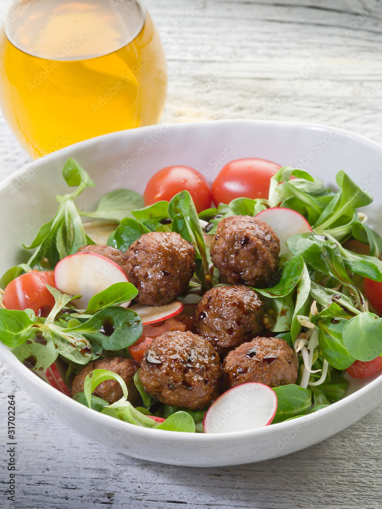 mixed salad with vegetarian meatballs slice radish and soy spro mixed salad with vegetarian meatballs slice radish and soy spro