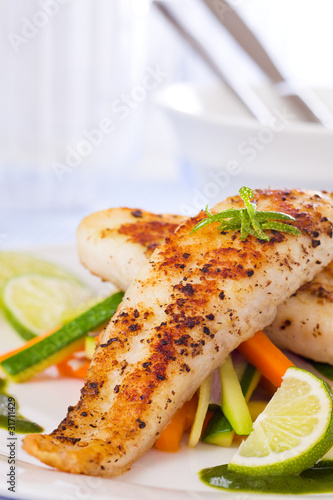 Healthy fish pangasius meal photo