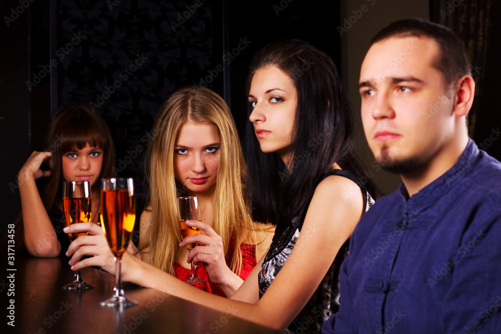 Young people relaxing in a bar