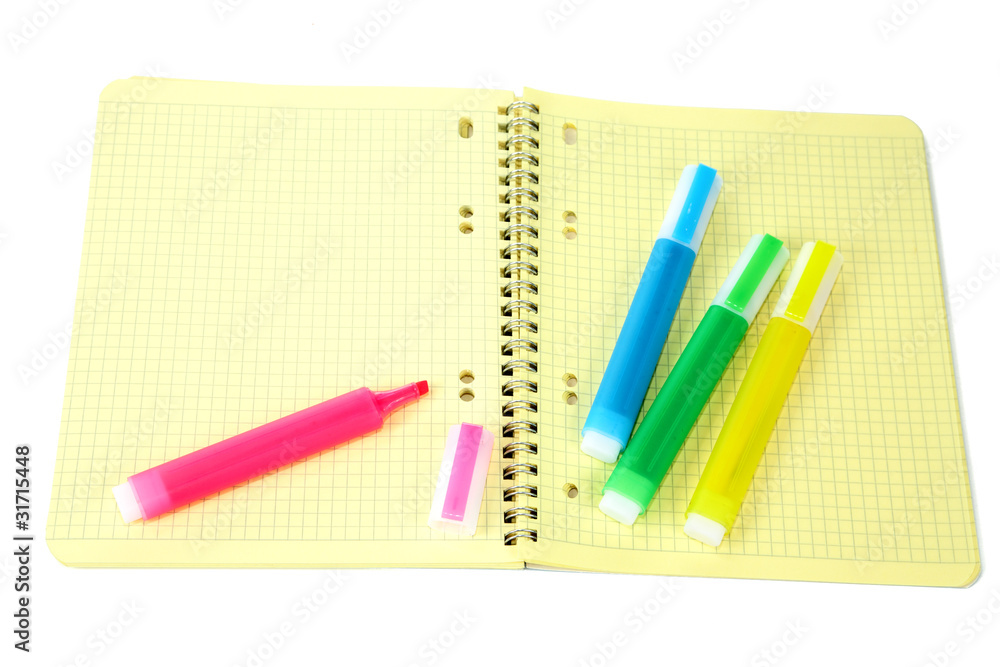 Markers and writing-book with a spiral Markers and writing-book with a spiral