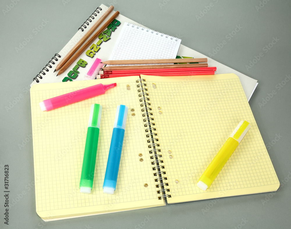Markers pencils a writing-book Markers pencils a writing-book