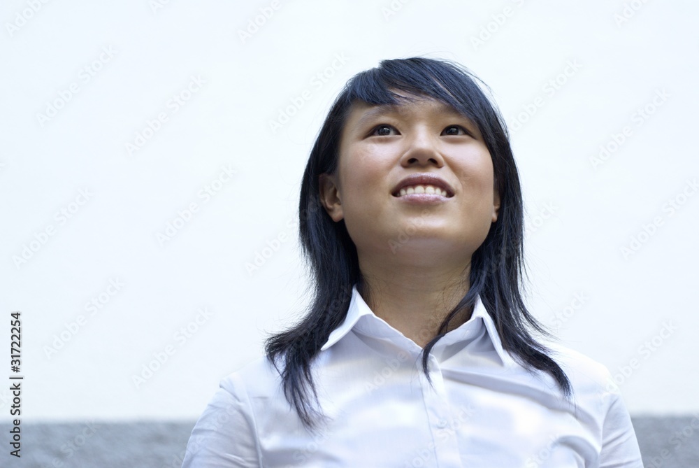 Aspiring lady executive looking up Aspiring lady executive looking up