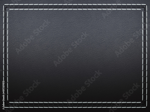 Stitched frame on black leather background