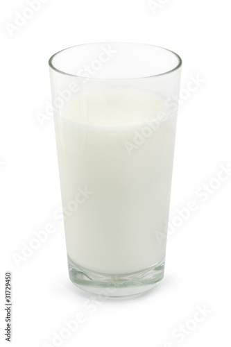 Glass of milk over white