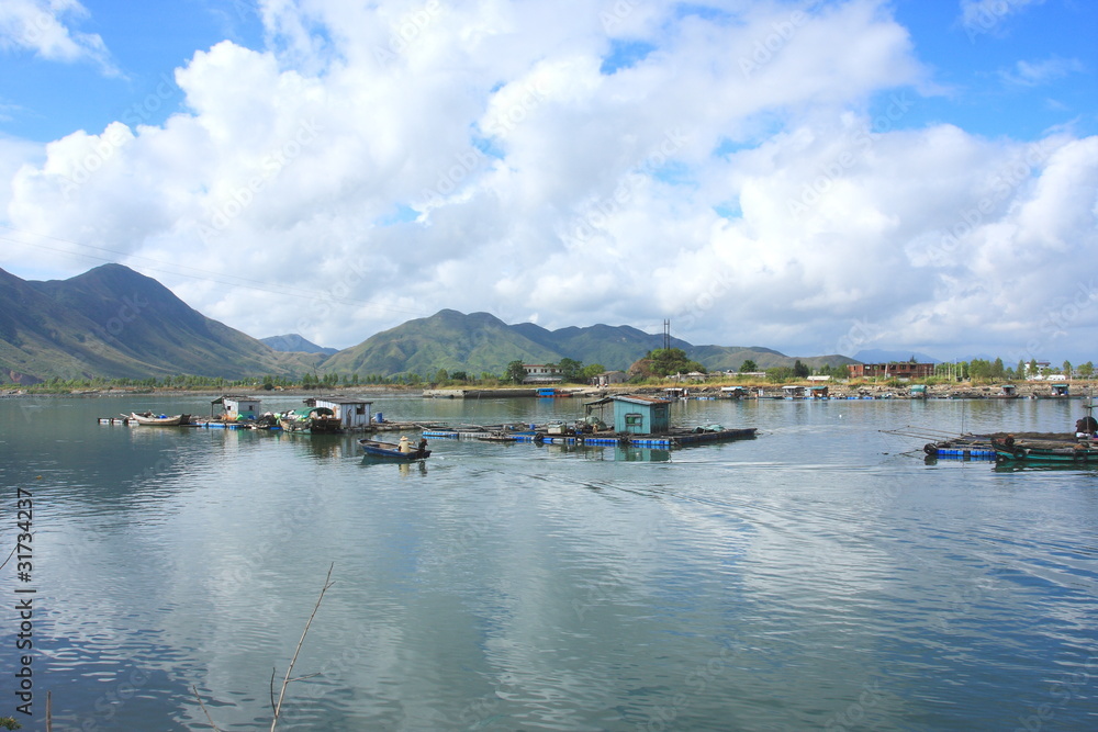 A tiny fishing village under the blue sky