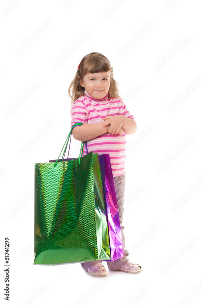 Little smiling girl with bags Little smiling girl with bags