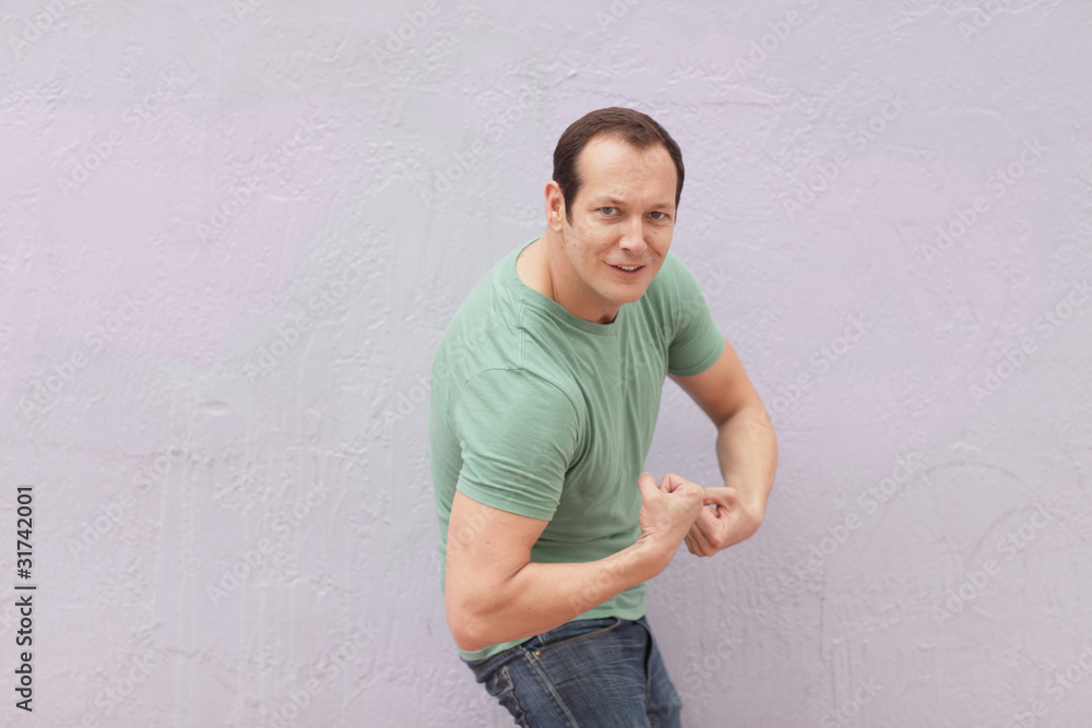 Man flexing his arms Man flexing his arms