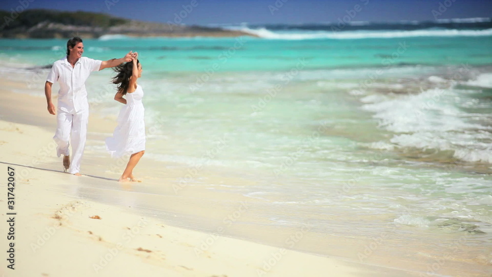 Attractive Couple Enjoying Paradise Vacation Attractive Couple Enjoying Paradise Vacation