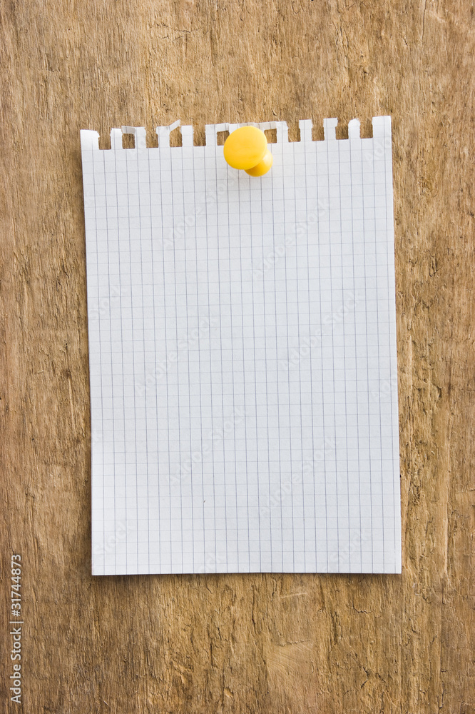 A piece of paper pinned the button A piece of paper pinned the button