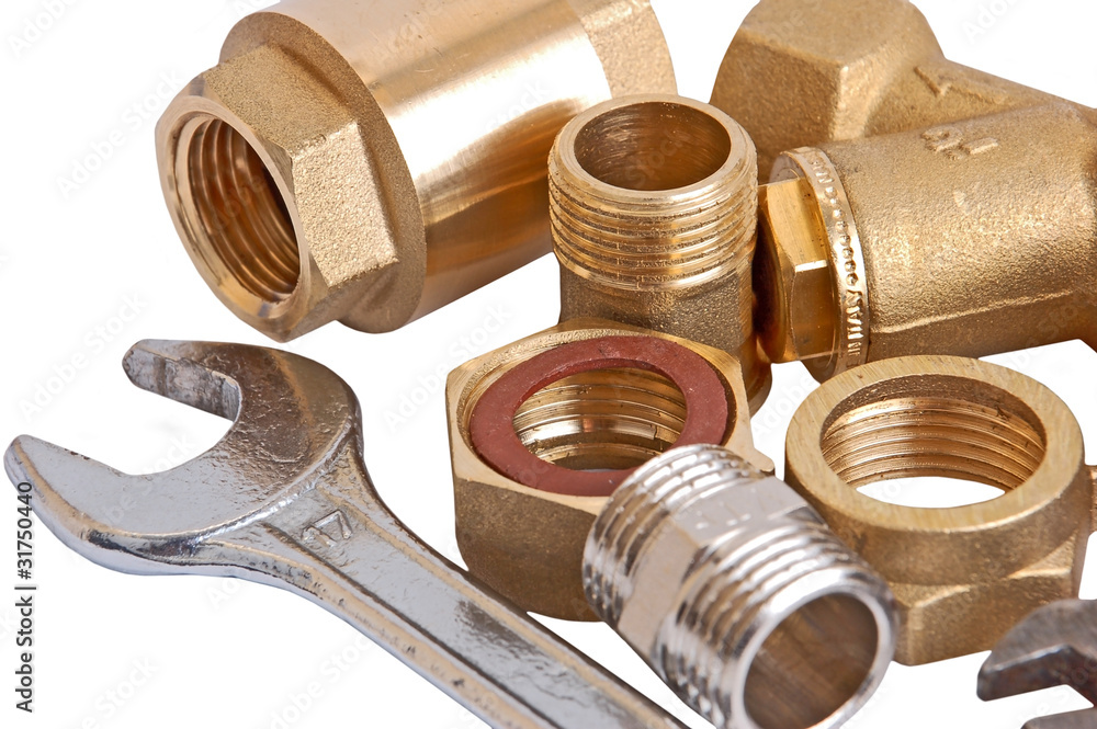 Plumbing pipe and wrench, isolated on white background