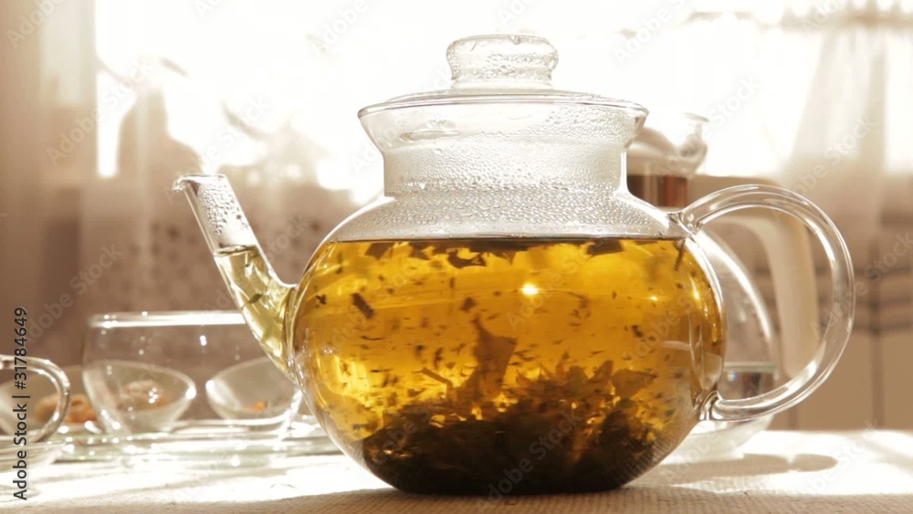 Herbal Tea in clear glass teapot Herbal Tea in clear glass teapot