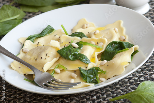 Ricotta and herb ravioli with spinach
