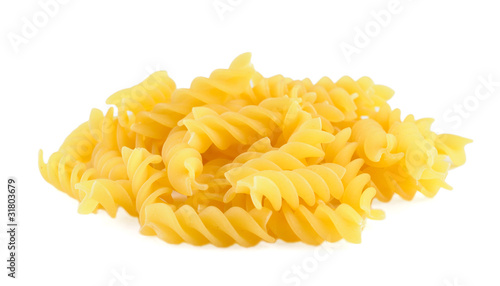 Pile of pasta fusilli on white background