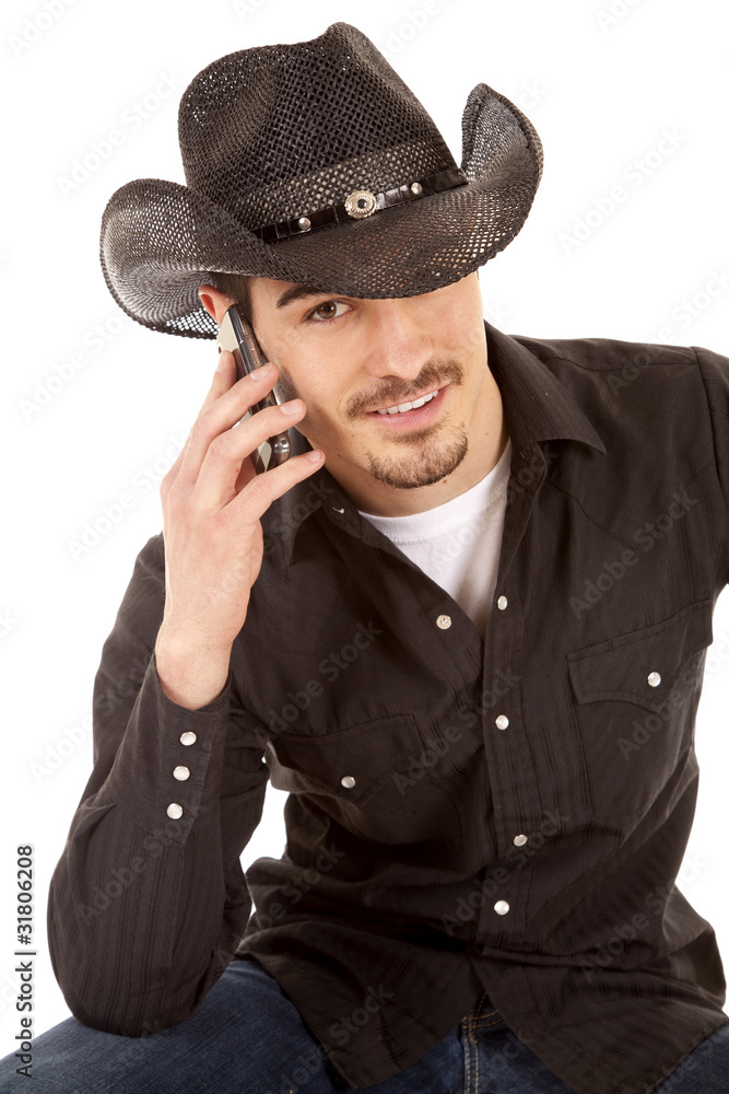 Cowboy on phone smile Cowboy on phone smile
