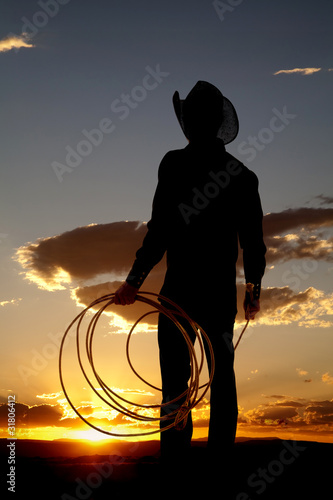 Cowboy silhouette rope down