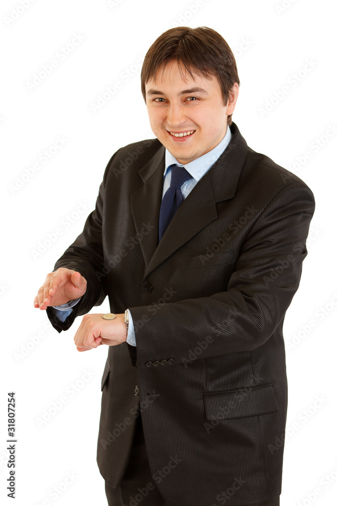 Heads or tails? Smiling businessman holding euro coin on hand