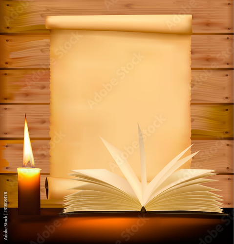 Old paper, candle and open book on wood background.