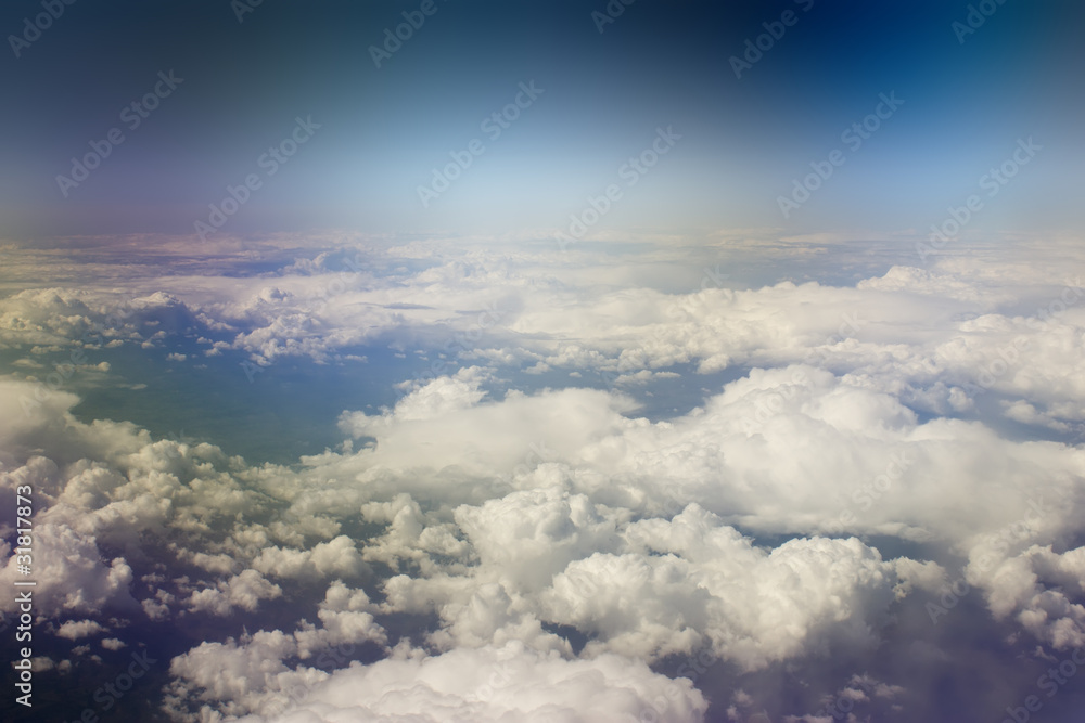 kind on clouds on a background a firmament from an airplane kind on clouds on a background a firmament from an airplane