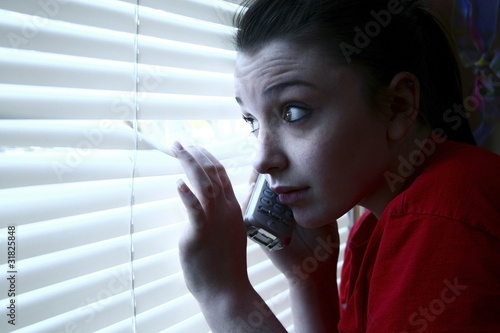 Teenage Girl On The Phone, Peeking Out The Window