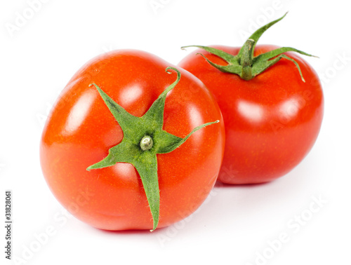 Red fresh tomato isolated on white