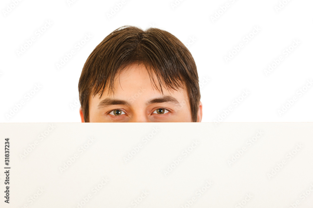 Man's head looking out from blank billboard isolated on white. Man's head looking out from blank billboard isolated on white.
